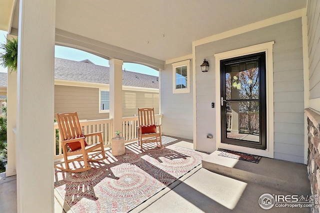doorway to property featuring a porch