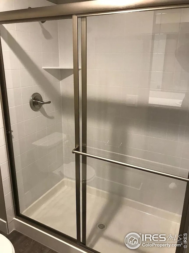 full bath featuring a stall shower