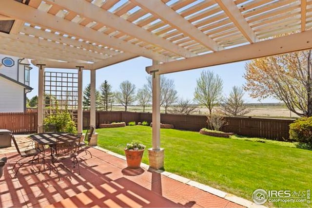 view of patio with a fenced backyard, a pergola, and outdoor dining space