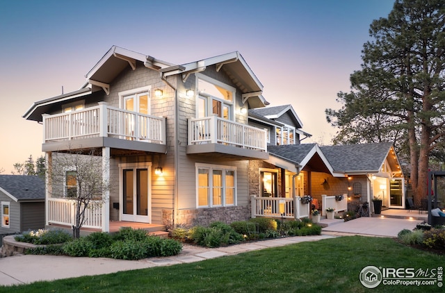 709 Baseline Rd, Boulder, CO 80302 - view of front of property featuring a balcony, stone siding, and a porch