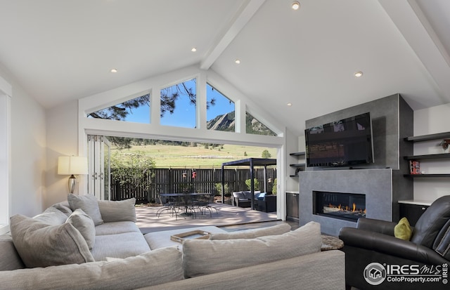 living room featuring recessed lighting, beamed ceiling, high vaulted ceiling, and a fireplace