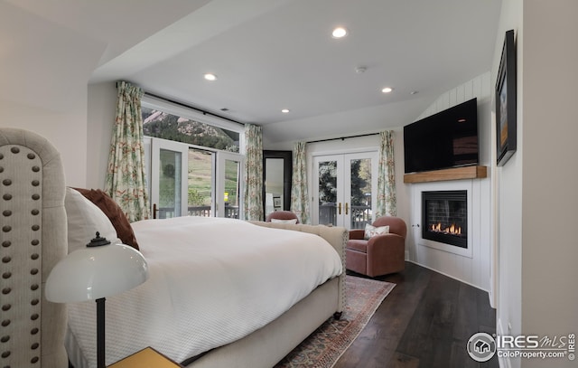 709 Baseline Rd, Boulder, CO 80302 - bedroom with wood finished floors, french doors, a large fireplace, access to outside, and recessed lighting