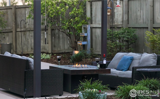 709 Baseline Rd, Boulder, CO 80302 - view of patio / terrace featuring an outdoor living space with a fire pit and a fenced backyard