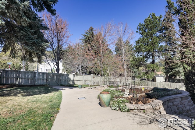 exterior space with fence and a gate