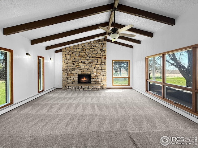 26237 County Road 65, Holyoke, CO 80734 - unfurnished living room with ceiling fan, a textured ceiling, carpet flooring, a stone fireplace, and a baseboard heating unit