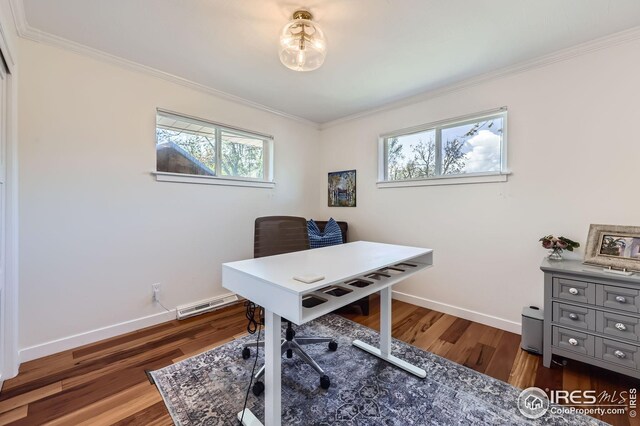 office area with visible vents, a healthy amount of sunlight, and wood finished floors