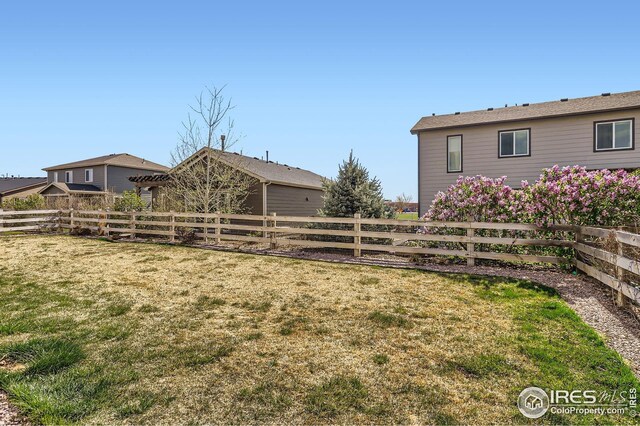 357 Chipman Dr, Windsor, CO 80550 - view of yard featuring a fenced backyard