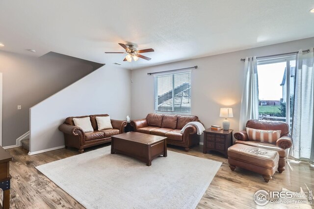 357 Chipman Dr, Windsor, CO 80550 - living area with a ceiling fan, light wood-type flooring, stairs, baseboards, and recessed lighting