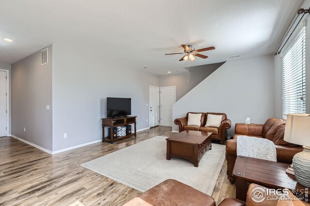 357 Chipman Dr, Windsor, CO 80550 - living area featuring baseboards, a ceiling fan, wood finished floors, and visible vents