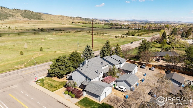 bird's eye view featuring a mountain view and a rural view