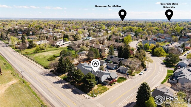 birds eye view of property with a residential view