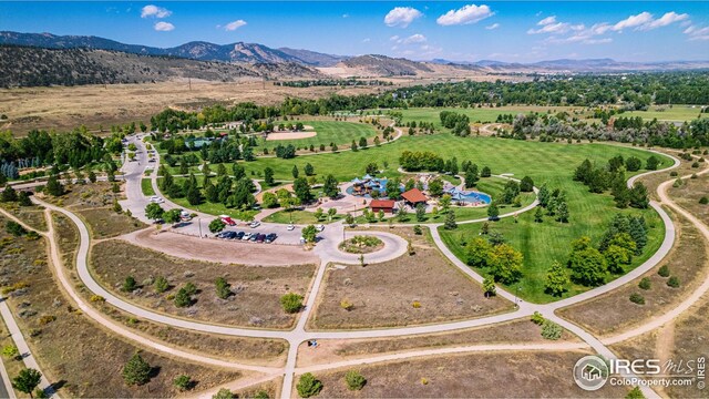 drone / aerial view featuring a mountain view