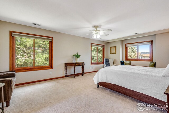 7628 Estate Cir, Niwot, CO 80503 - bedroom featuring baseboards, carpet flooring, and visible vents