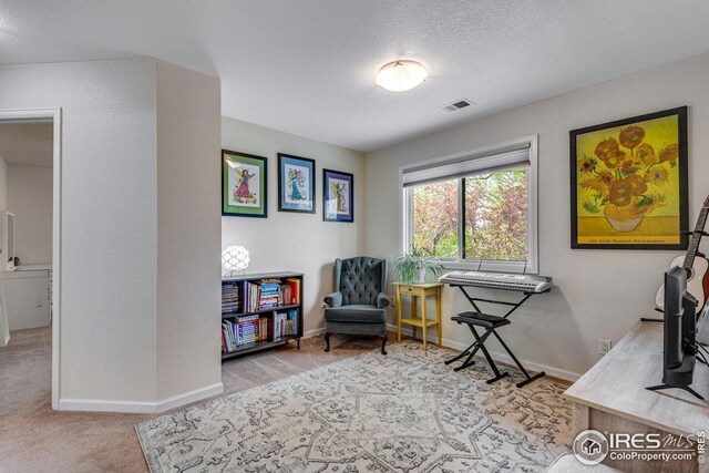7628 Estate Cir, Niwot, CO 80503 - living area with visible vents, carpet flooring, and baseboards