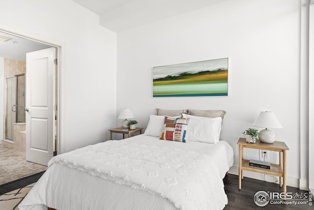 2001 Lincoln St Unit 2113, Denver, CO 80202 - bedroom with wood finished floors and ensuite bathroom