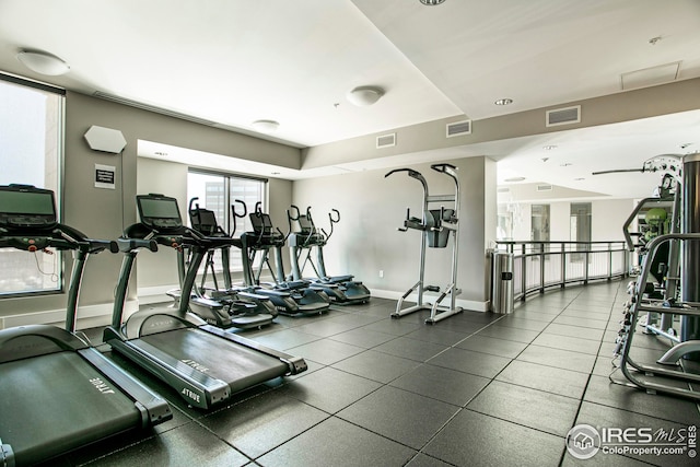 2001 Lincoln St Unit 2113, Denver, CO 80202 - exercise room featuring baseboards