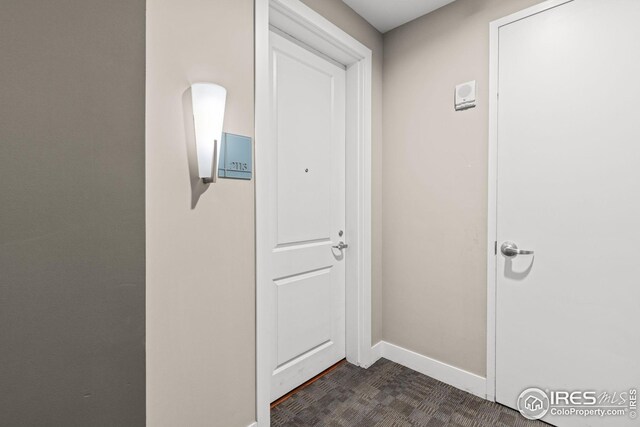 2001 Lincoln St Unit 2113, Denver, CO 80202 - hallway featuring baseboards
