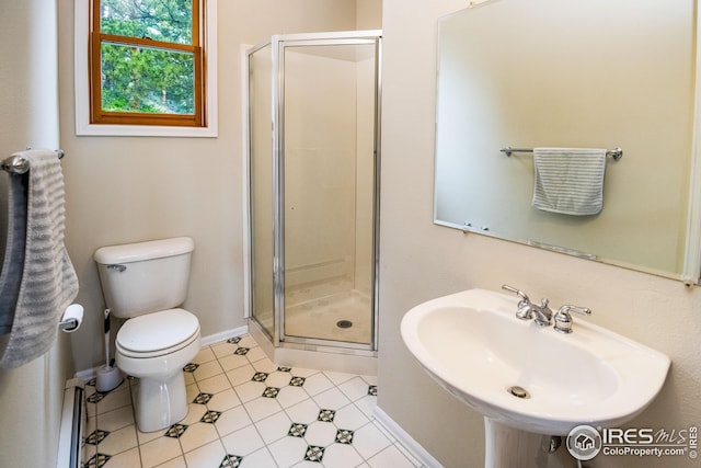 18 Pine St, Jamestown, CO 80455 - bathroom with a sink, a shower stall, toilet, tile patterned floors, and baseboards