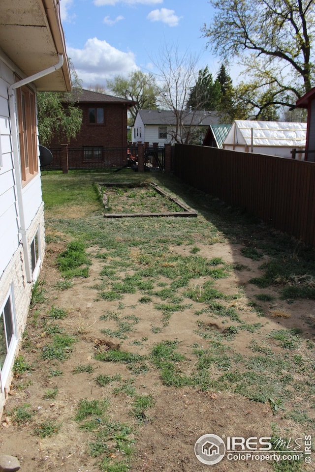 817 Warner St, Fort Morgan, CO 80701 - view of yard with fence