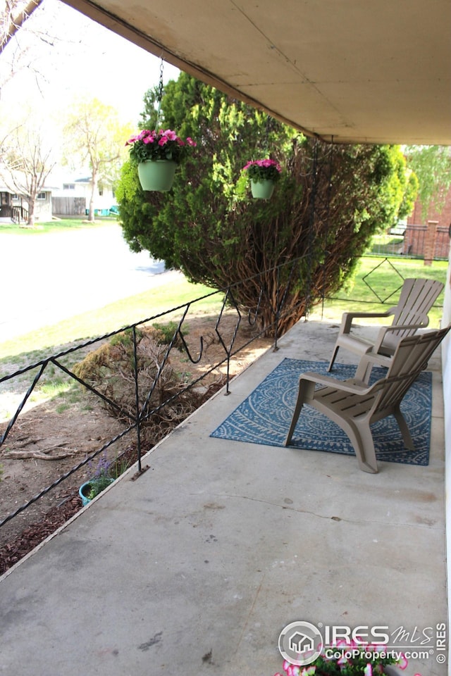 817 Warner St, Fort Morgan, CO 80701 - view of patio / terrace with fence