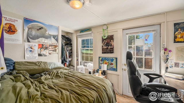 bedroom with light wood-style floors