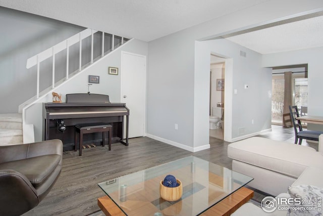 750 W Moorhead Cir Unit A, Boulder, CO 80305 - living area with stairway, wood finished floors, and baseboards
