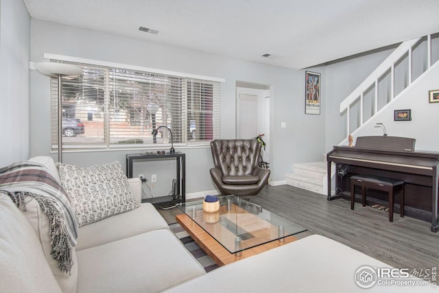750 W Moorhead Cir Unit A, Boulder, CO 80305 - living area featuring wood finished floors, stairs, and baseboards