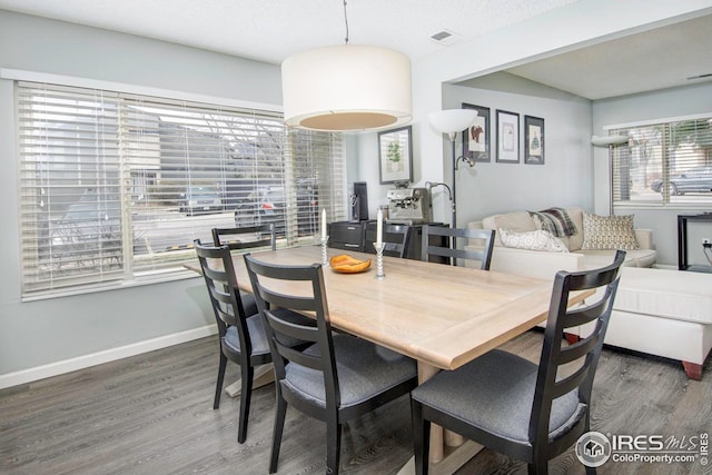 750 W Moorhead Cir Unit A, Boulder, CO 80305 - dining area featuring wood finished floors and baseboards