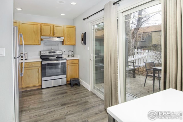 750 W Moorhead Cir Unit A, Boulder, CO 80305 - kitchen with stainless steel appliances, under cabinet range hood, dark wood-type flooring, recessed lighting, and light countertops