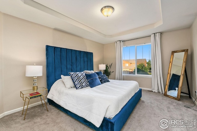 5433 Wishing Well Dr, Timnath, CO 80547 - bedroom with baseboards, carpet, and a tray ceiling