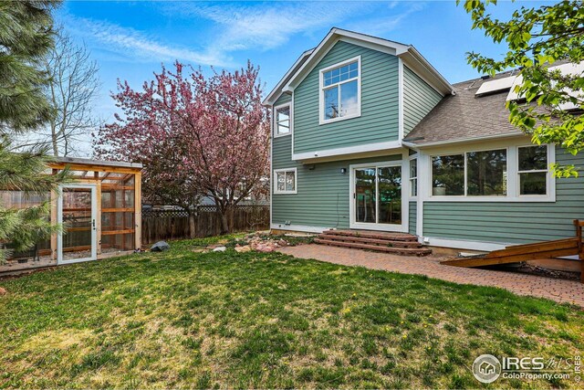 4856 10th St, Boulder, CO 80304 - back of property featuring a shingled roof and a greenhouse