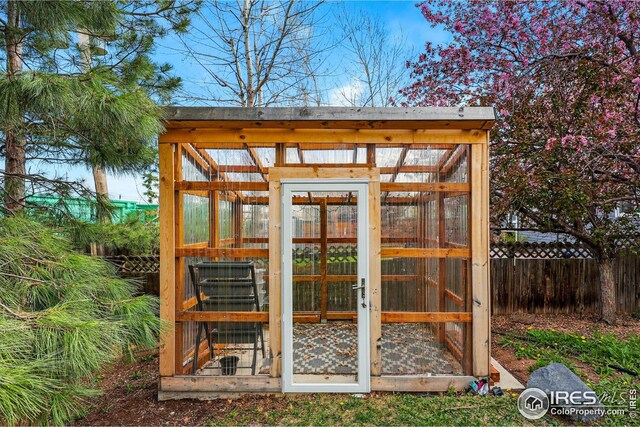 4856 10th St, Boulder, CO 80304 - view of greenhouse featuring fence