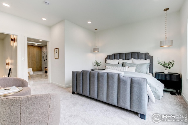 bedroom with baseboards, recessed lighting, and light carpet