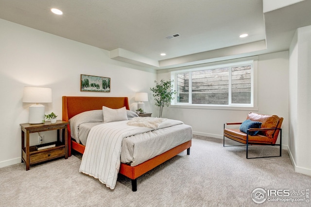 bedroom with light carpet, baseboards, and recessed lighting