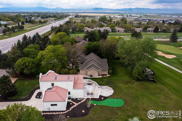 view from above of property with a mountainous background