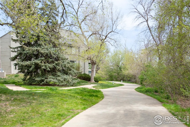 surrounding community with a lawn