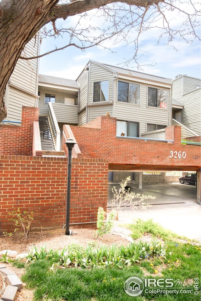 view of home's exterior featuring brick siding