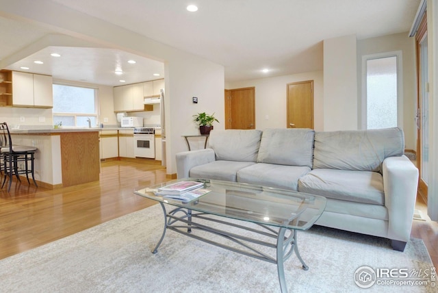 3821 Howe Ct, Boulder, CO 80301 - living room featuring light wood-style flooring and recessed lighting