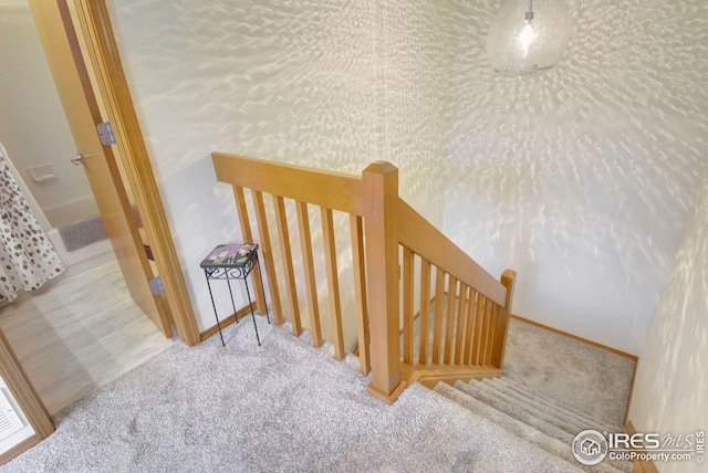 3821 Howe Ct, Boulder, CO 80301 - stairs featuring carpet and baseboards