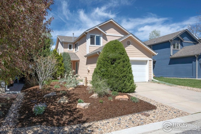 3821 Howe Ct, Boulder, CO 80301 - view of front of home with concrete driveway and an attached garage