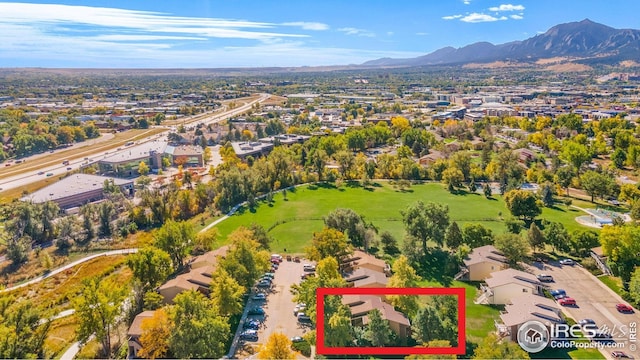 aerial perspective of suburban area featuring property parcel outlined and a mountain backdrop