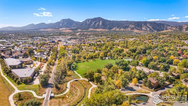 aerial overview of property's location featuring a mountain backdrop