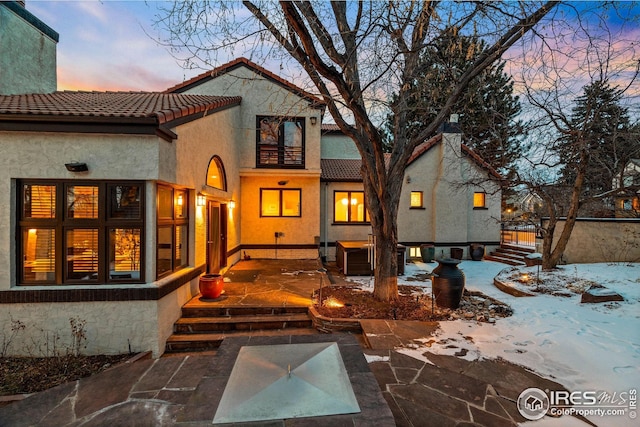 229 Albion St, Denver, CO 80220 - rear view of house featuring a tiled roof and stucco siding