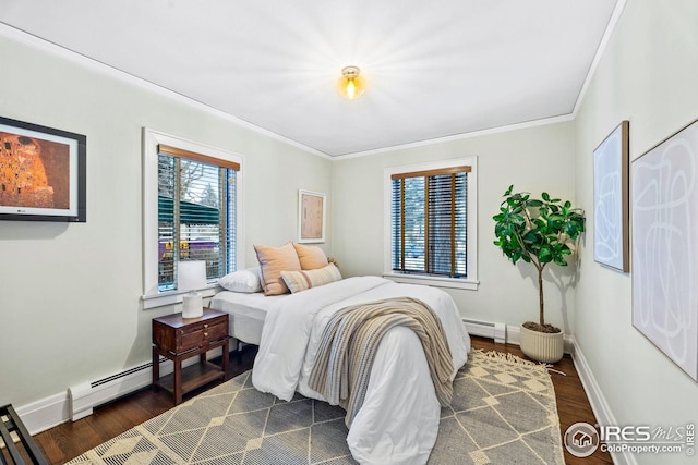 229 Albion St, Denver, CO 80220 - bedroom with ornamental molding, a baseboard radiator, dark wood-style flooring, and baseboards