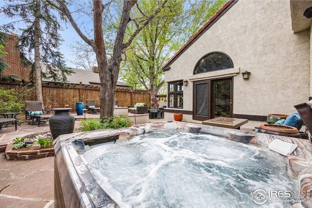 229 Albion St, Denver, CO 80220 - view of patio featuring a hot tub and grilling area