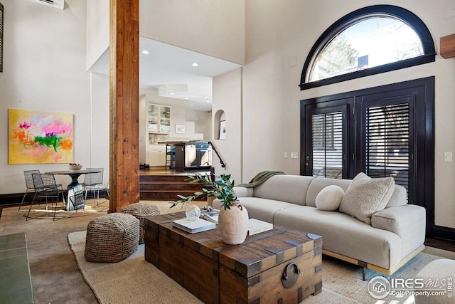 229 Albion St, Denver, CO 80220 - living room with a towering ceiling and baseboards