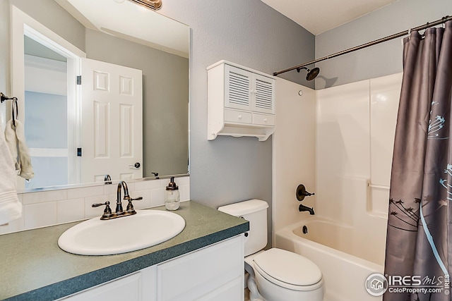 1108 Basin Ct, Windsor, CO 80550 - bathroom featuring shower / bathtub combination with curtain, vanity, and toilet