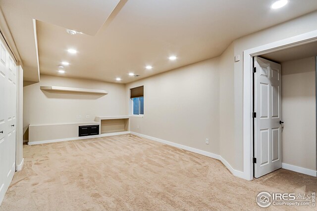 1108 Basin Ct, Windsor, CO 80550 - basement featuring recessed lighting, carpet, and baseboards