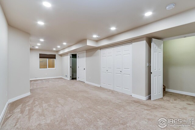 1108 Basin Ct, Windsor, CO 80550 - finished basement featuring carpet floors, baseboards, and recessed lighting