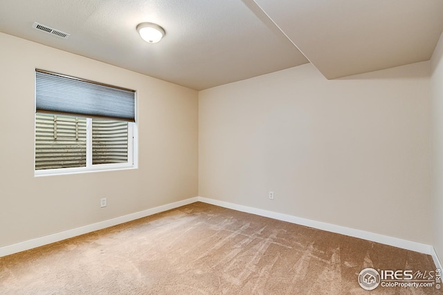 1108 Basin Ct, Windsor, CO 80550 - carpeted spare room featuring baseboards